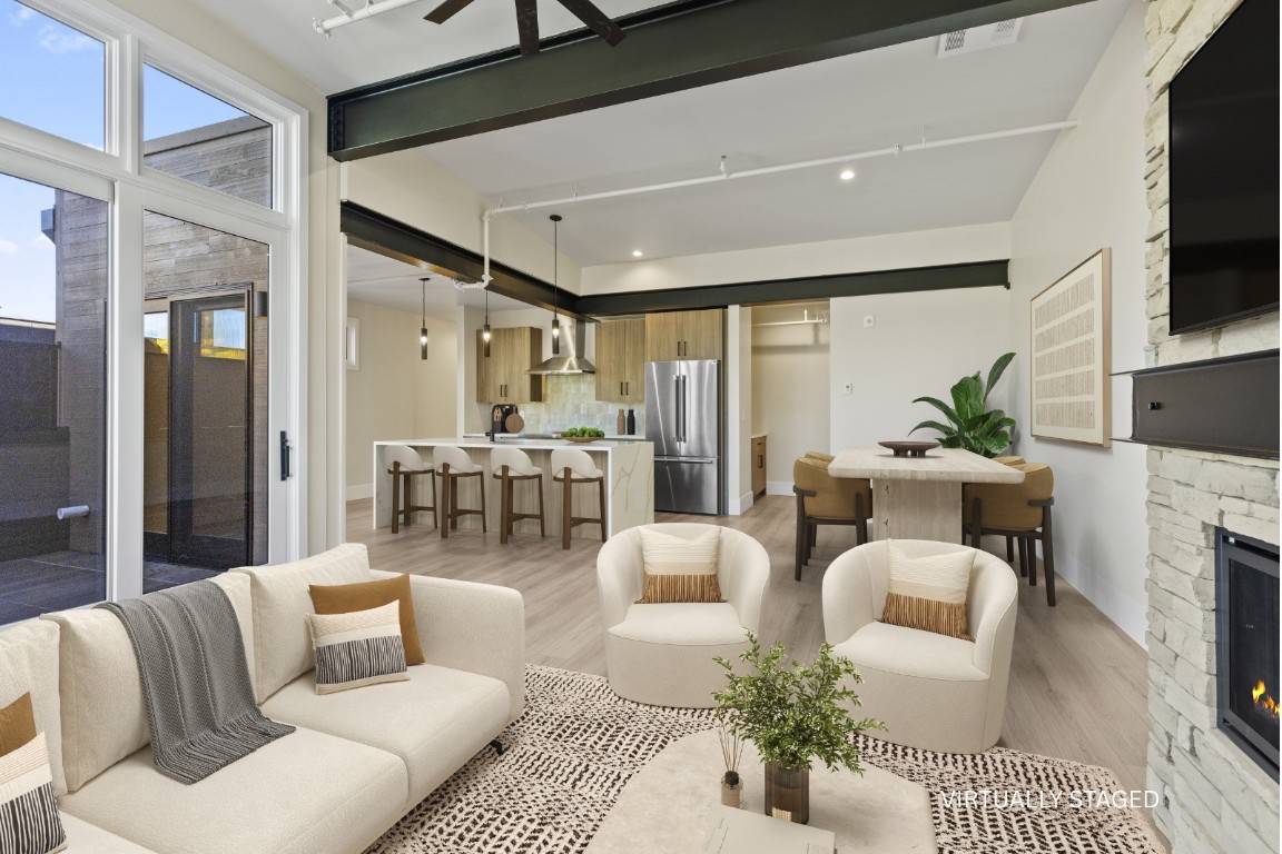 310 East Main Street, Unit 202 Frisco, CO 80443 - Photo 18 of 45 a living room with furniture or outdoor view and a fireplace