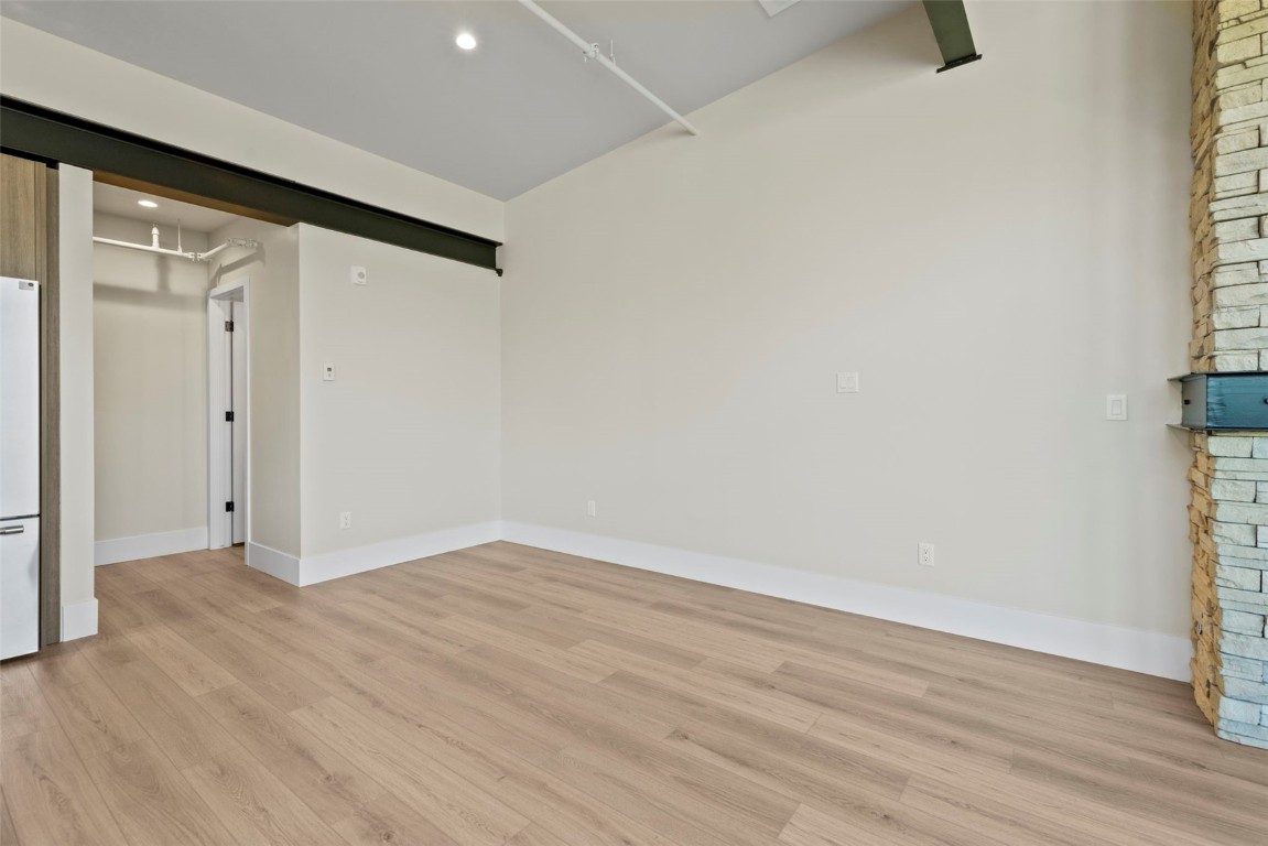 310 East Main Street, Unit 202 Frisco, CO 80443 - Photo 21 of 45 a view of an empty room with wooden floor and a window
