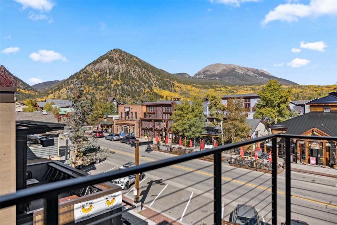 310 East Main Street, Unit 202 Frisco, CO 80443 - Photo 26 of 45 a view of a balcony with an outdoor seating