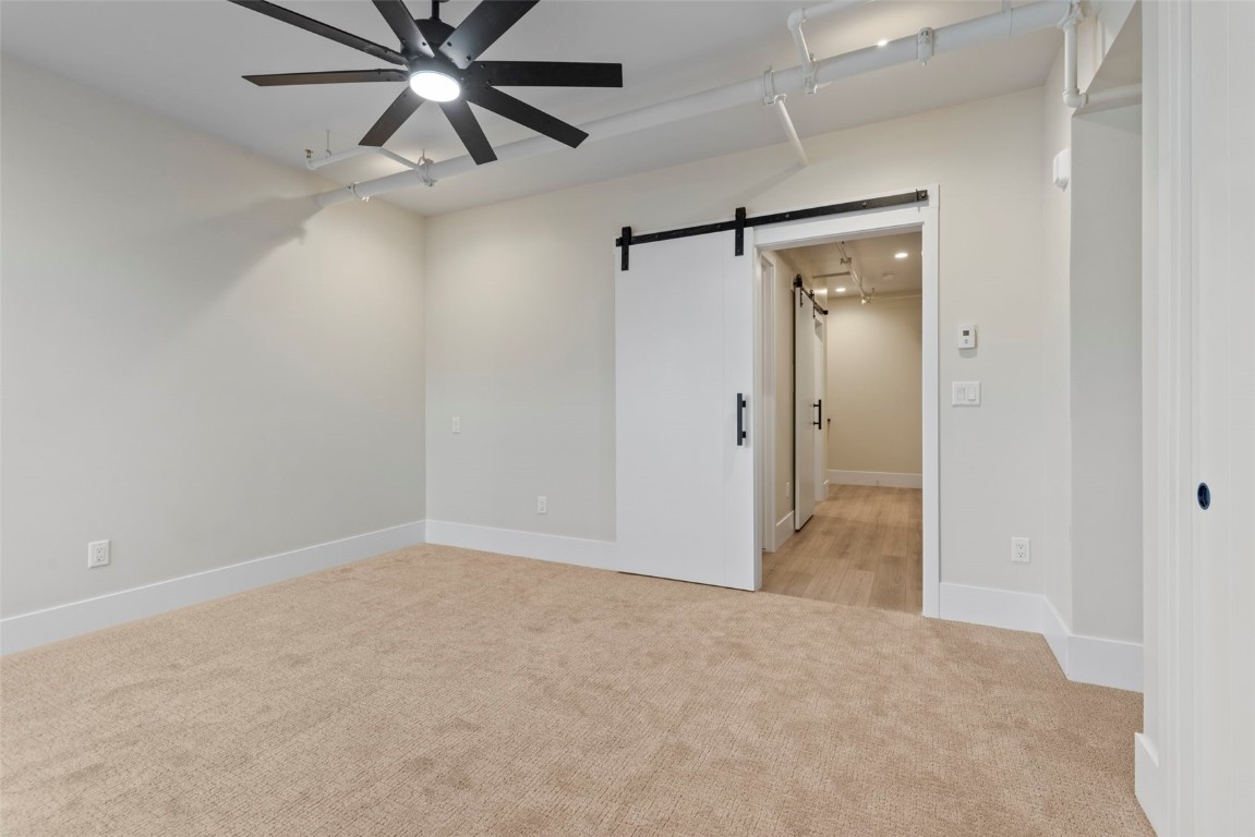 310 East Main Street, Unit 202 Frisco, CO 80443 - Photo 33 of 45 en empty room with closet and a chandelier fan