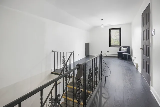 an aerial view of house with yard swimming pool and outdoor seating