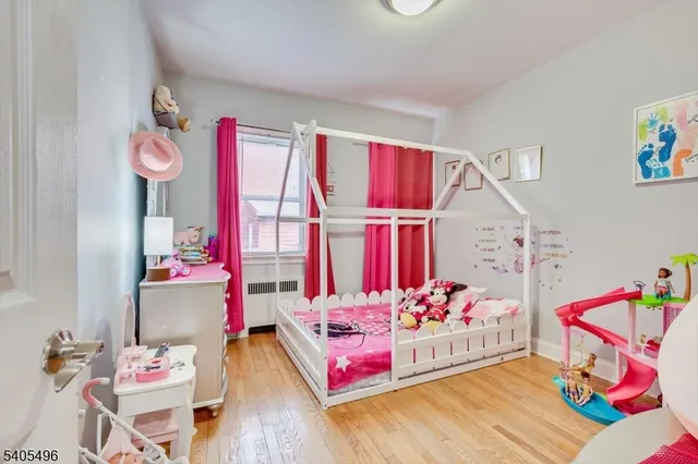 a bedroom with furniture and a bed