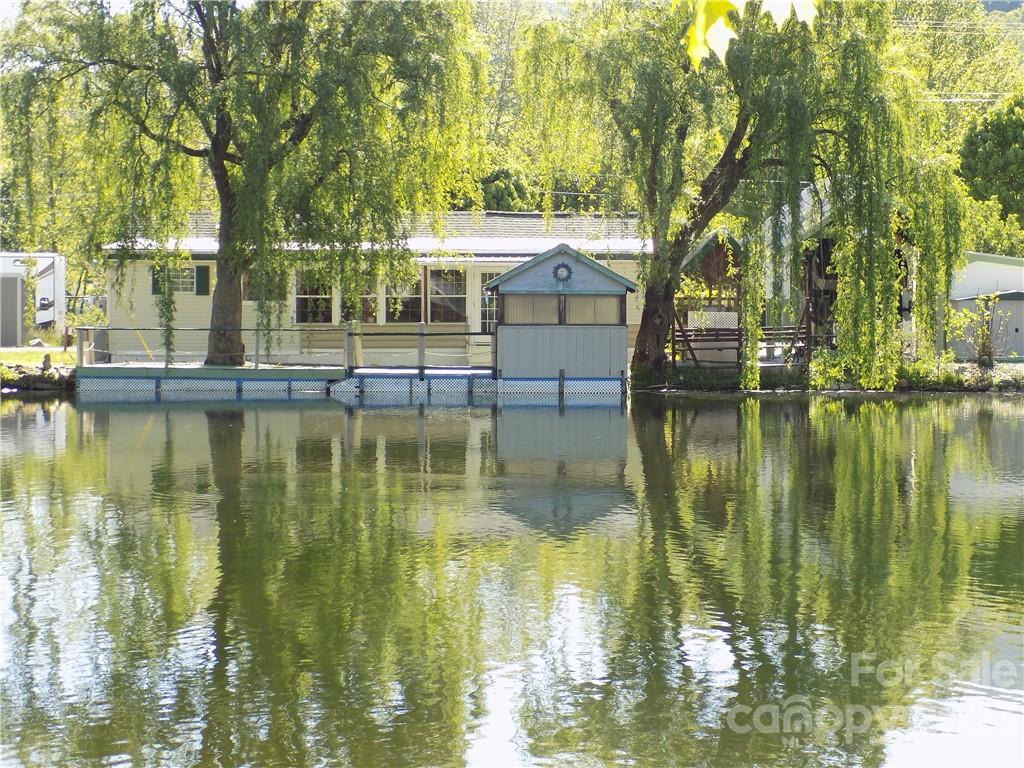 a backyard of a house with swimming pool