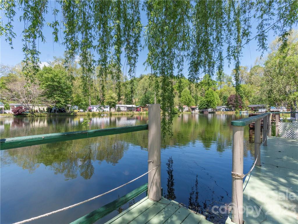 258 Mallard Loop Waynesville, NC 28785 - Photo 18 of 22 a view of a lake with houses in outdoor space