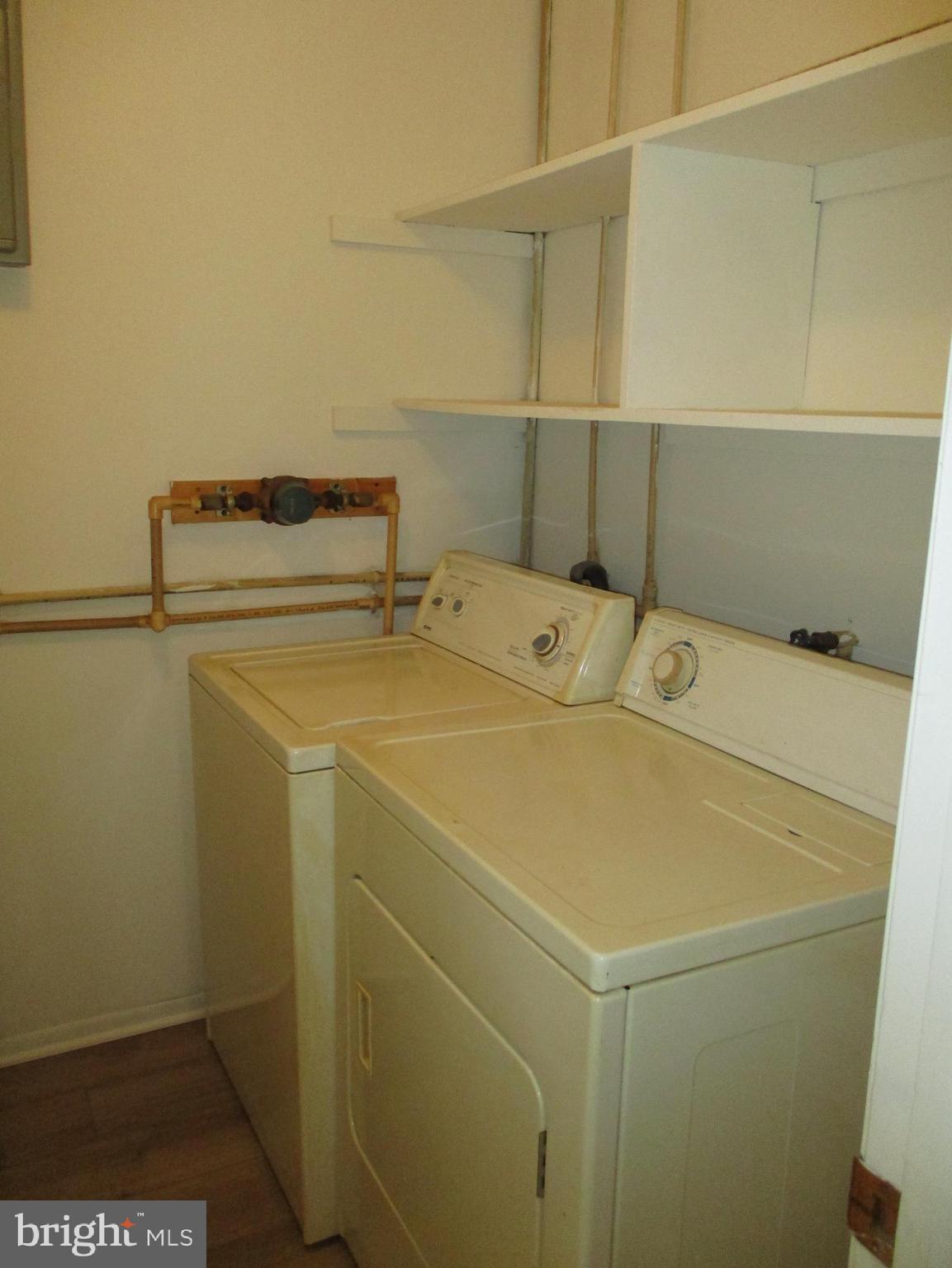 1 Fleming Drive, Unit B Hancock, MD 21750 - Photo 12 of 14 a utility room with dryer and washer