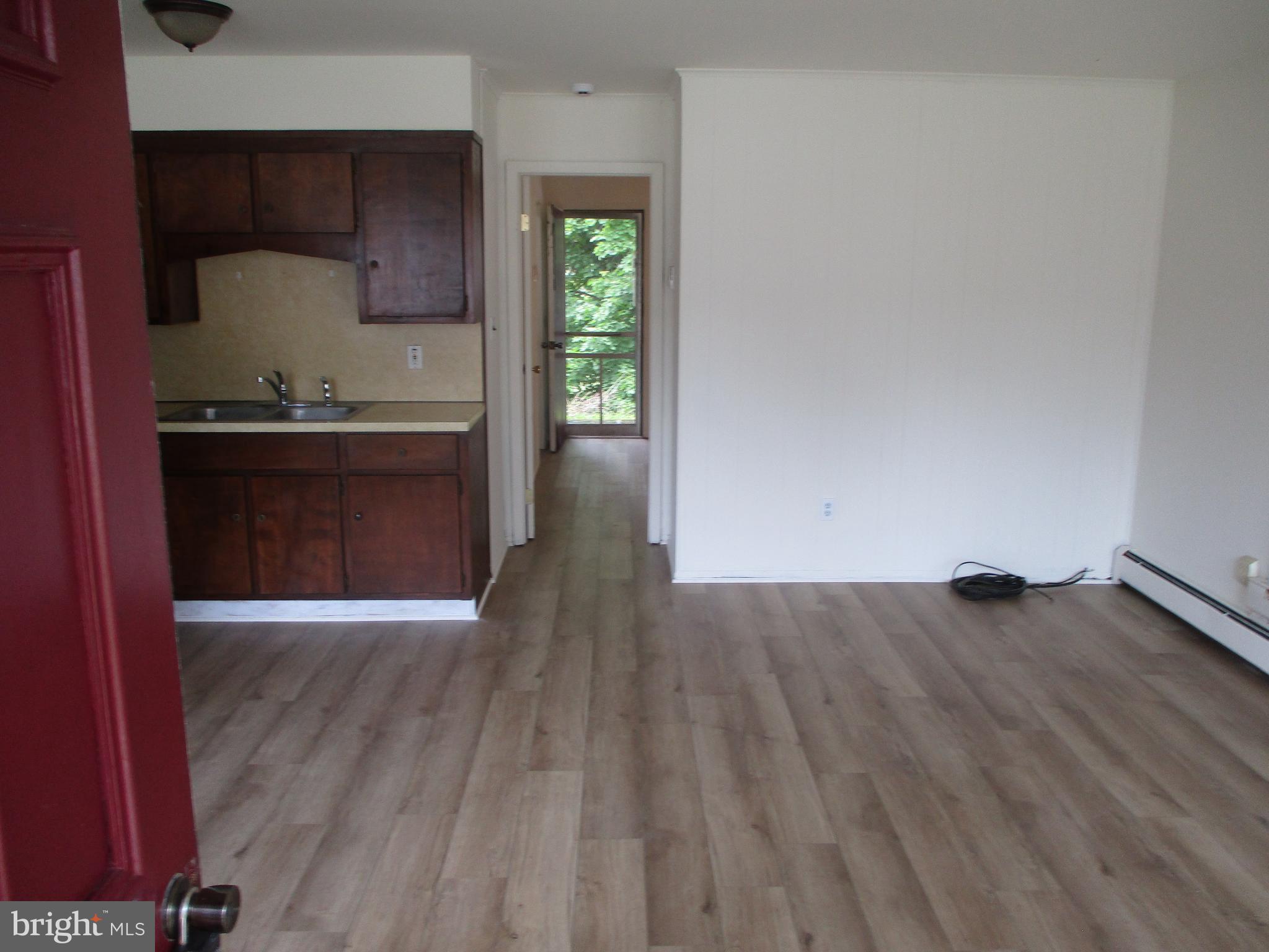 1 Fleming Drive, Unit B Hancock, MD 21750 - Photo 5 of 14 a view of kitchen with wooden floor