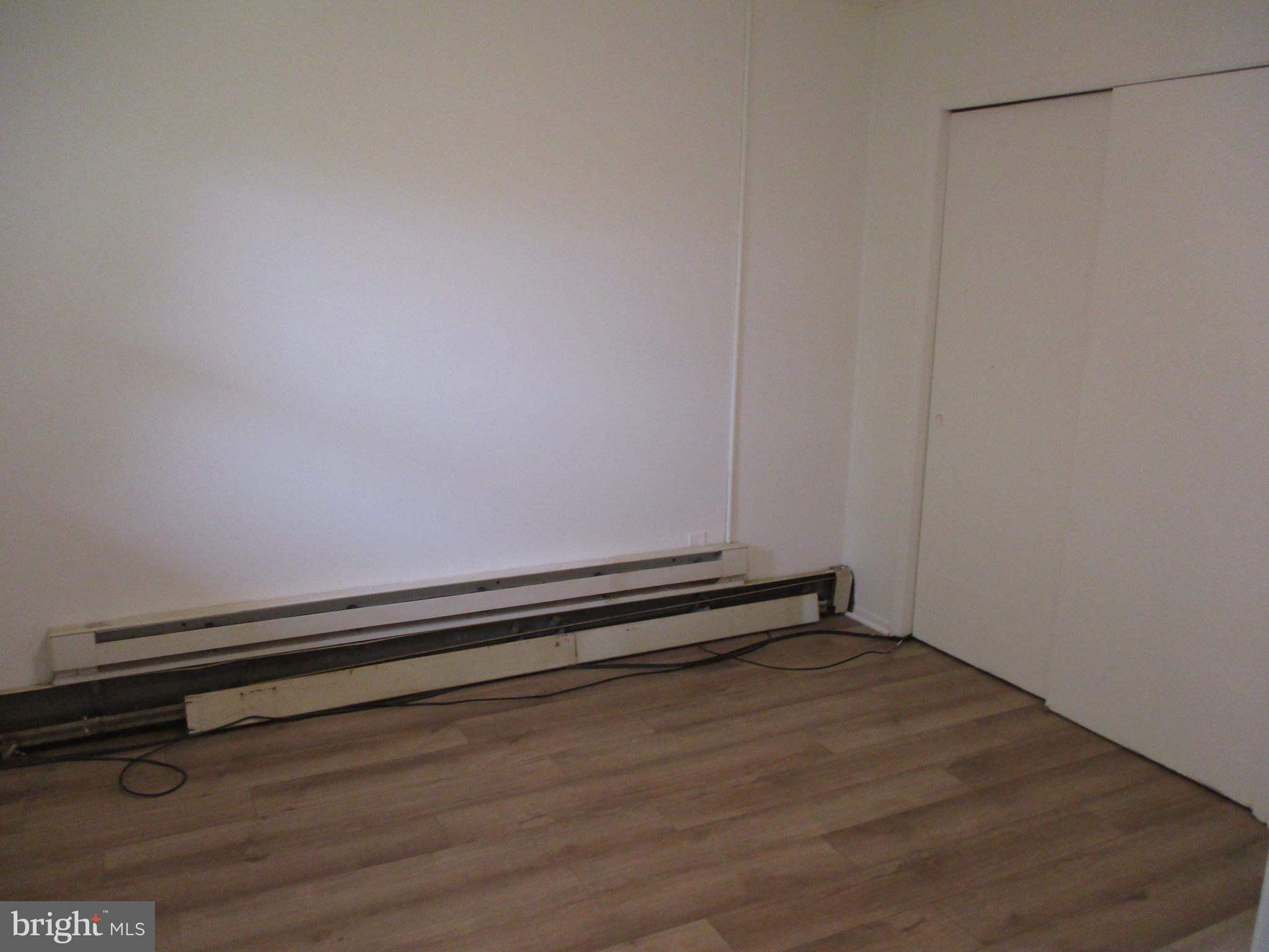 1 Fleming Drive, Unit B Hancock, MD 21750 - Photo 8 of 14 a view of room with wooden floor and fan