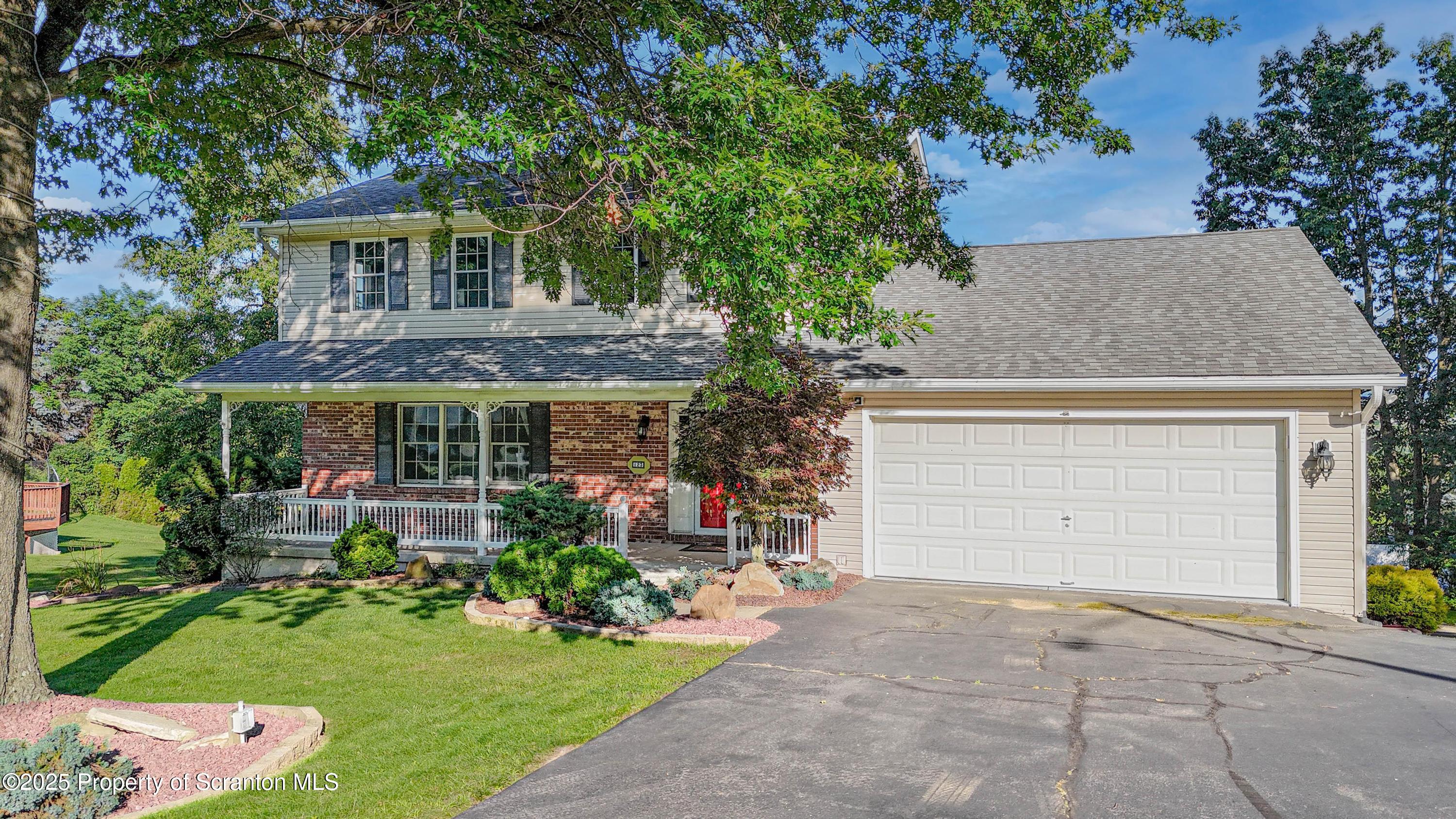 123 Ridgeview Drive Scranton, PA 18504 - Photo 1 of 53 front view of house with a yard