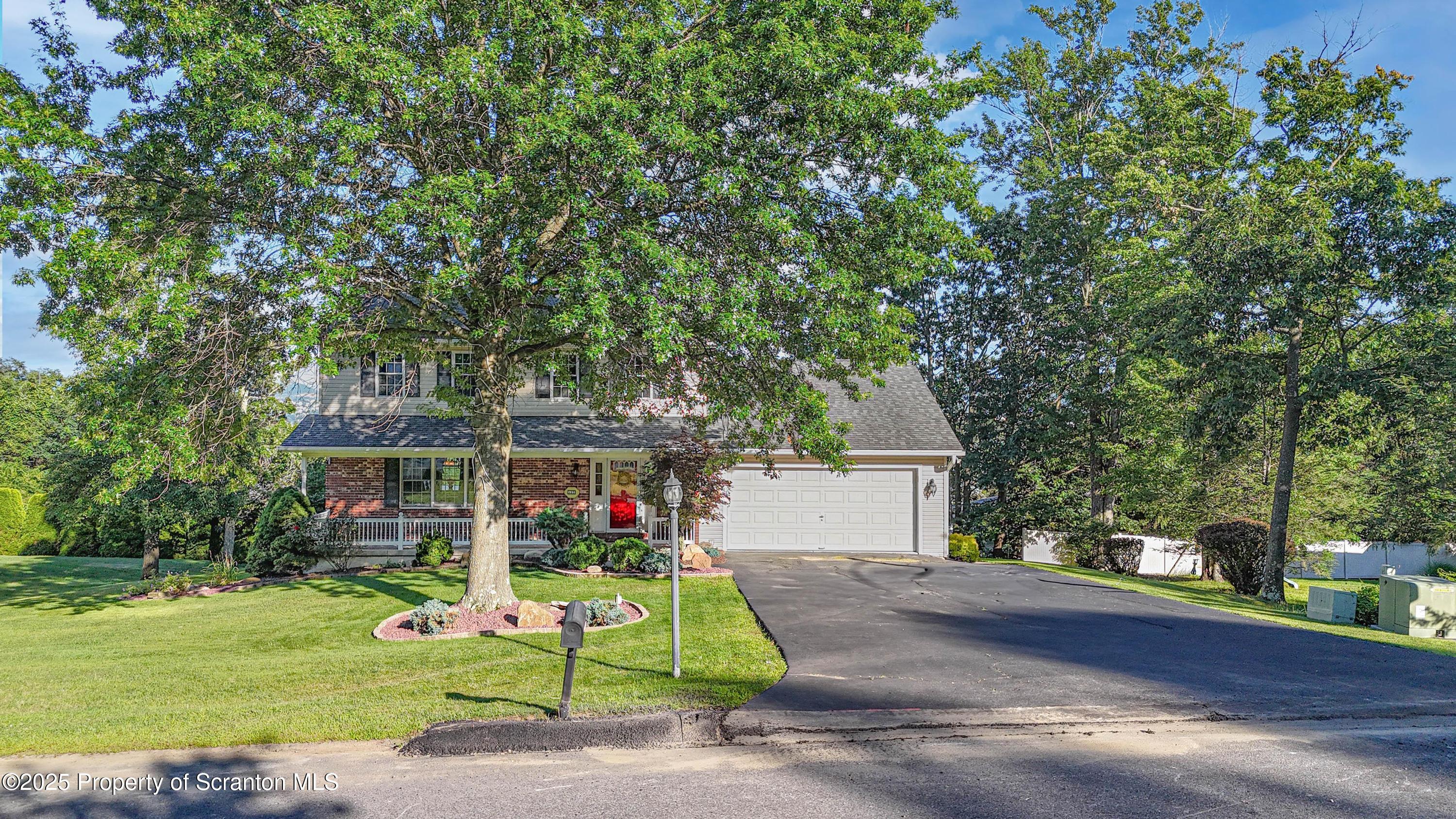 123 Ridgeview Drive Scranton, PA 18504 - Photo 2 of 53 a front view of house with yard