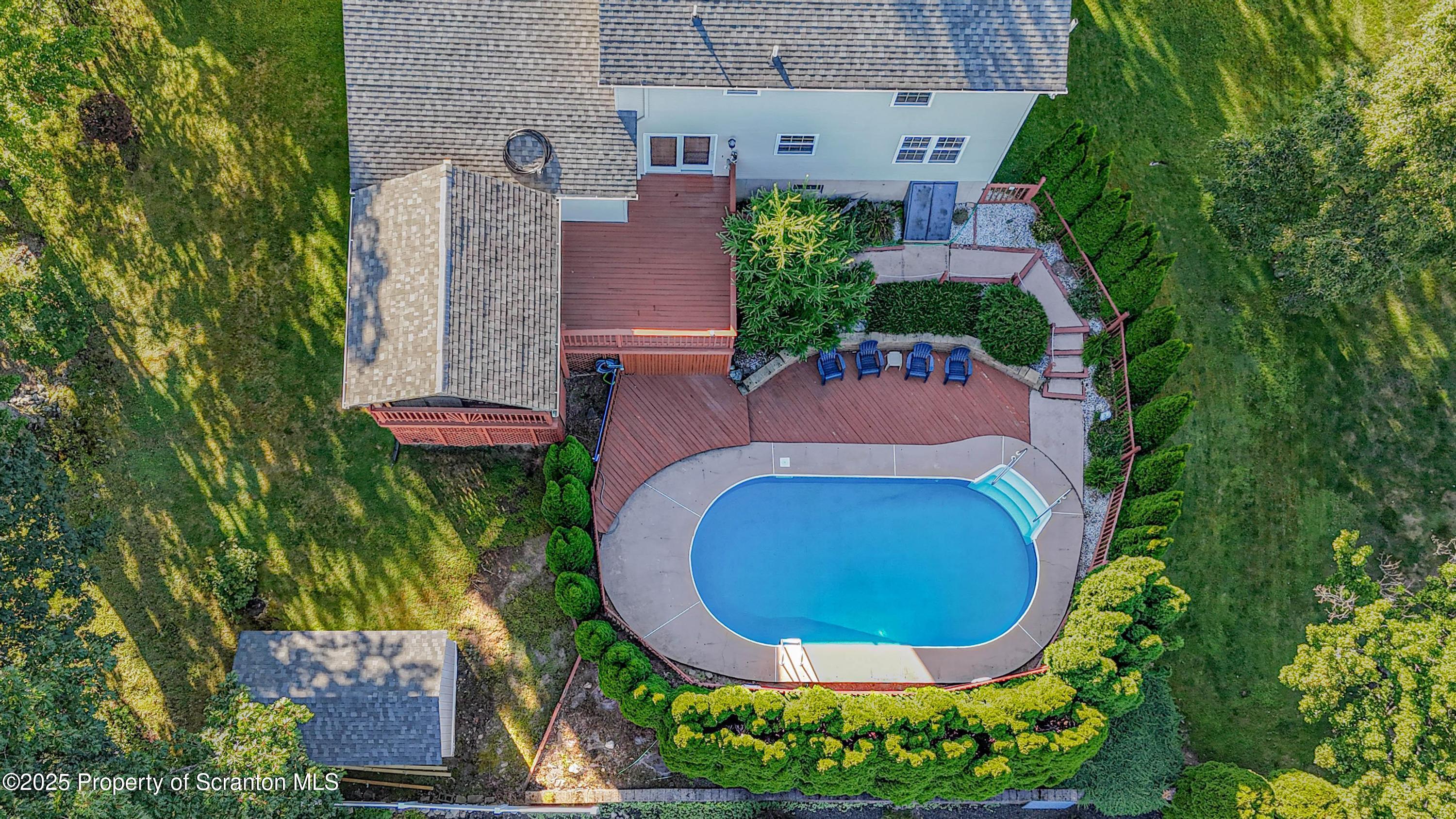 123 Ridgeview Drive Scranton, PA 18504 - Photo 4 of 53 an aerial view of a house with garden space and swimming pool