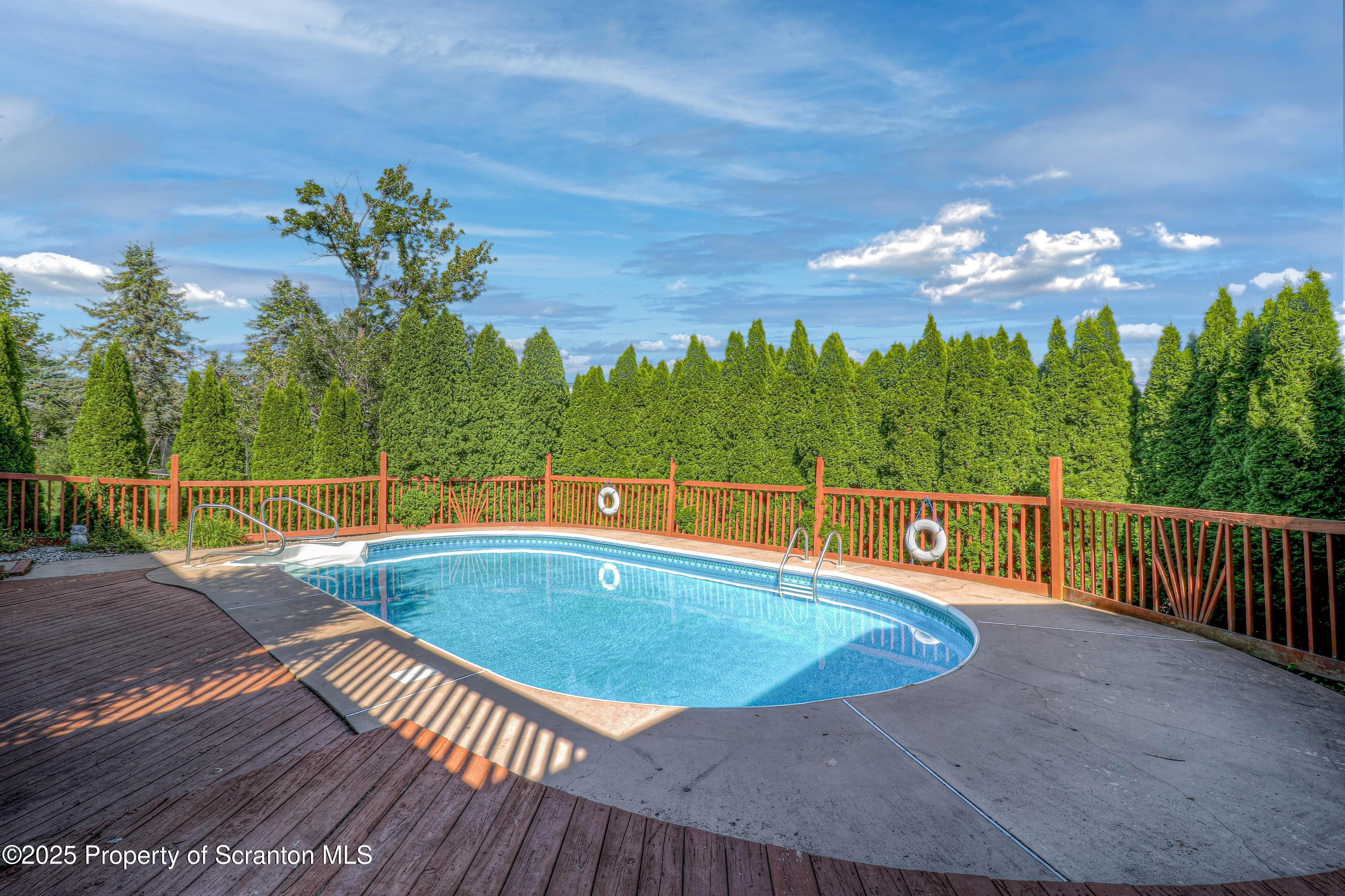 123 Ridgeview Drive Scranton, PA 18504 - Photo 5 of 53 a view of a swimming pool with a yard