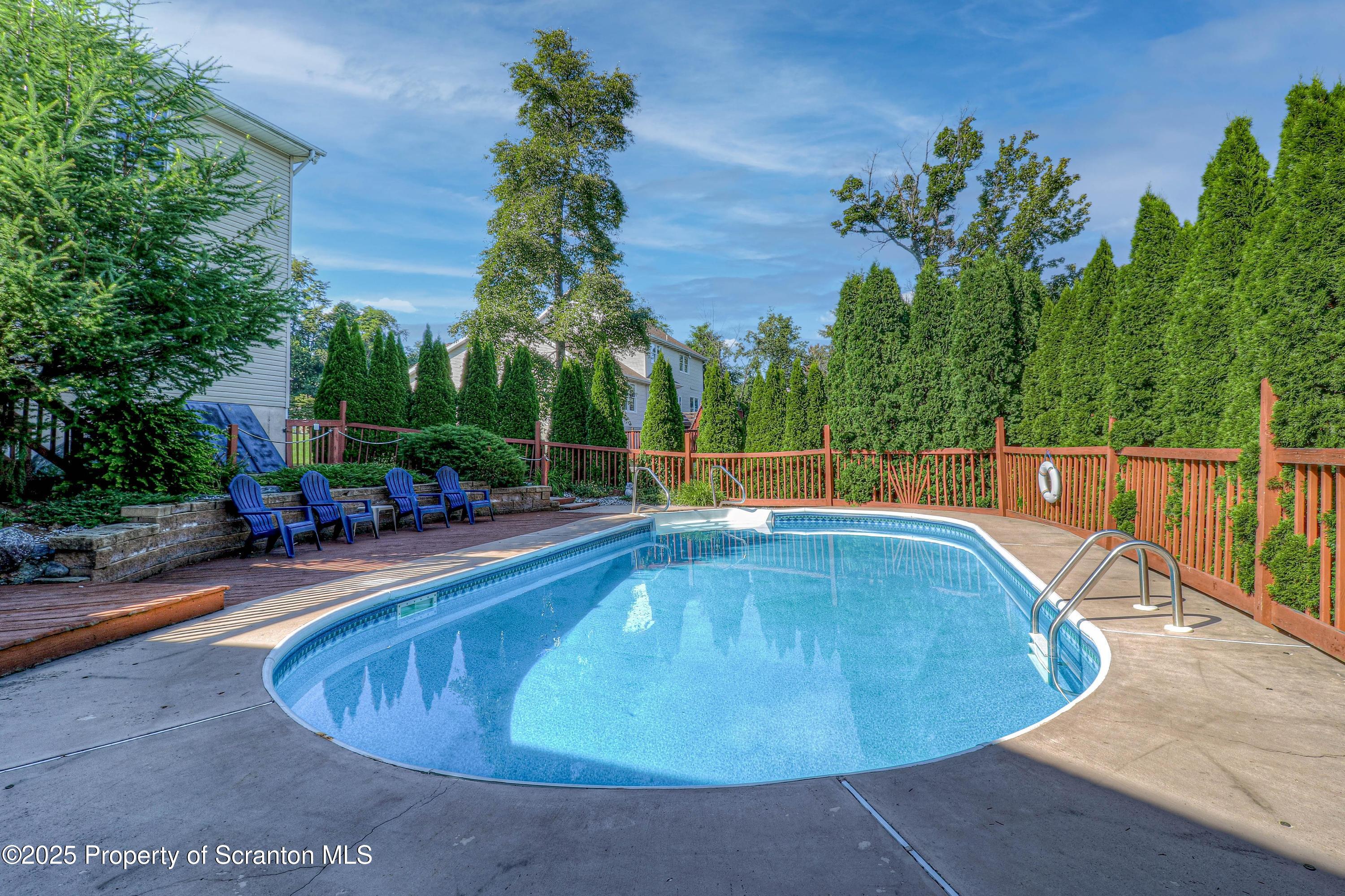 123 Ridgeview Drive Scranton, PA 18504 - Photo 6 of 53 a view of a swimming pool with a patio