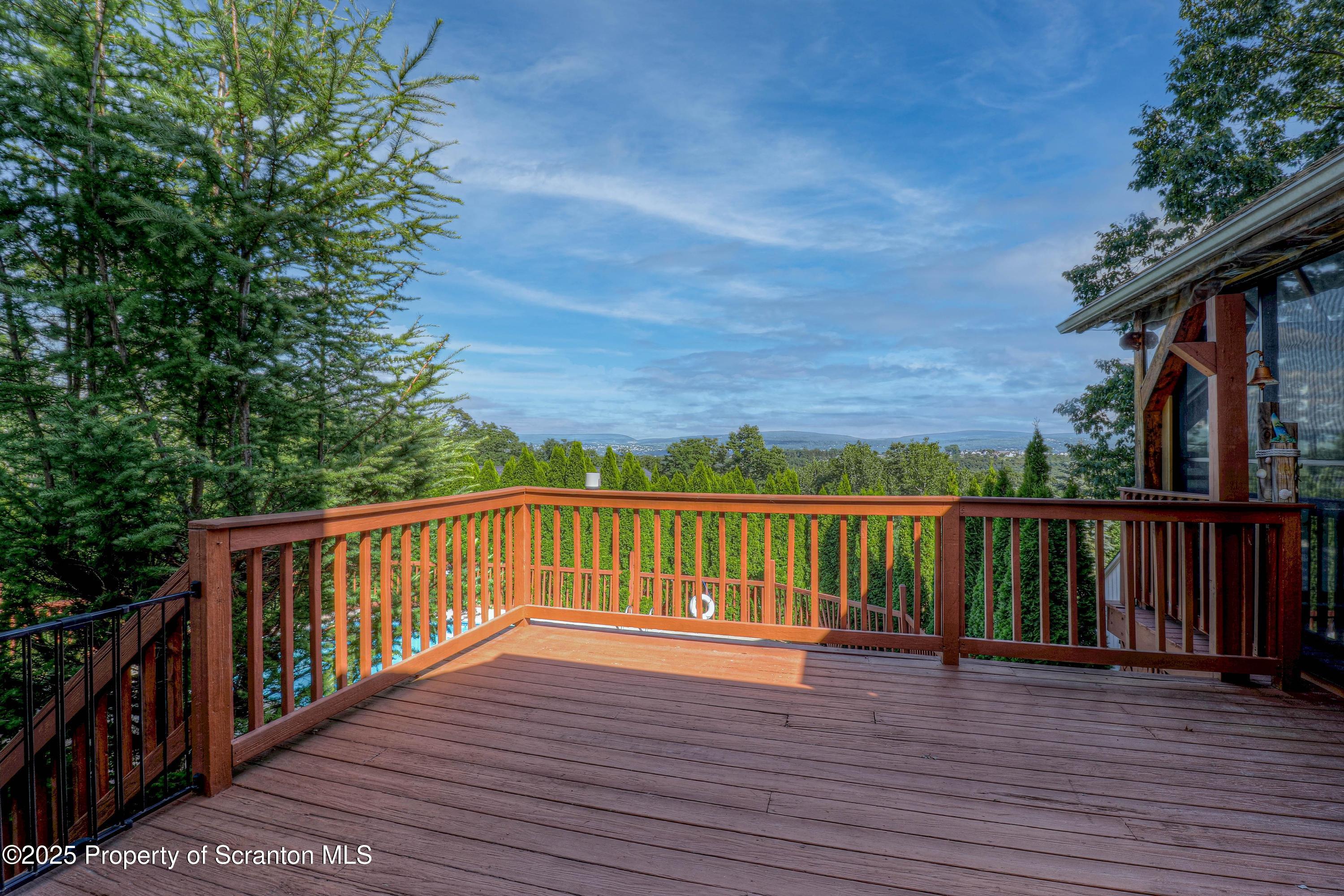 123 Ridgeview Drive Scranton, PA 18504 - Photo 7 of 53 a view of deck with wooden floor and fence