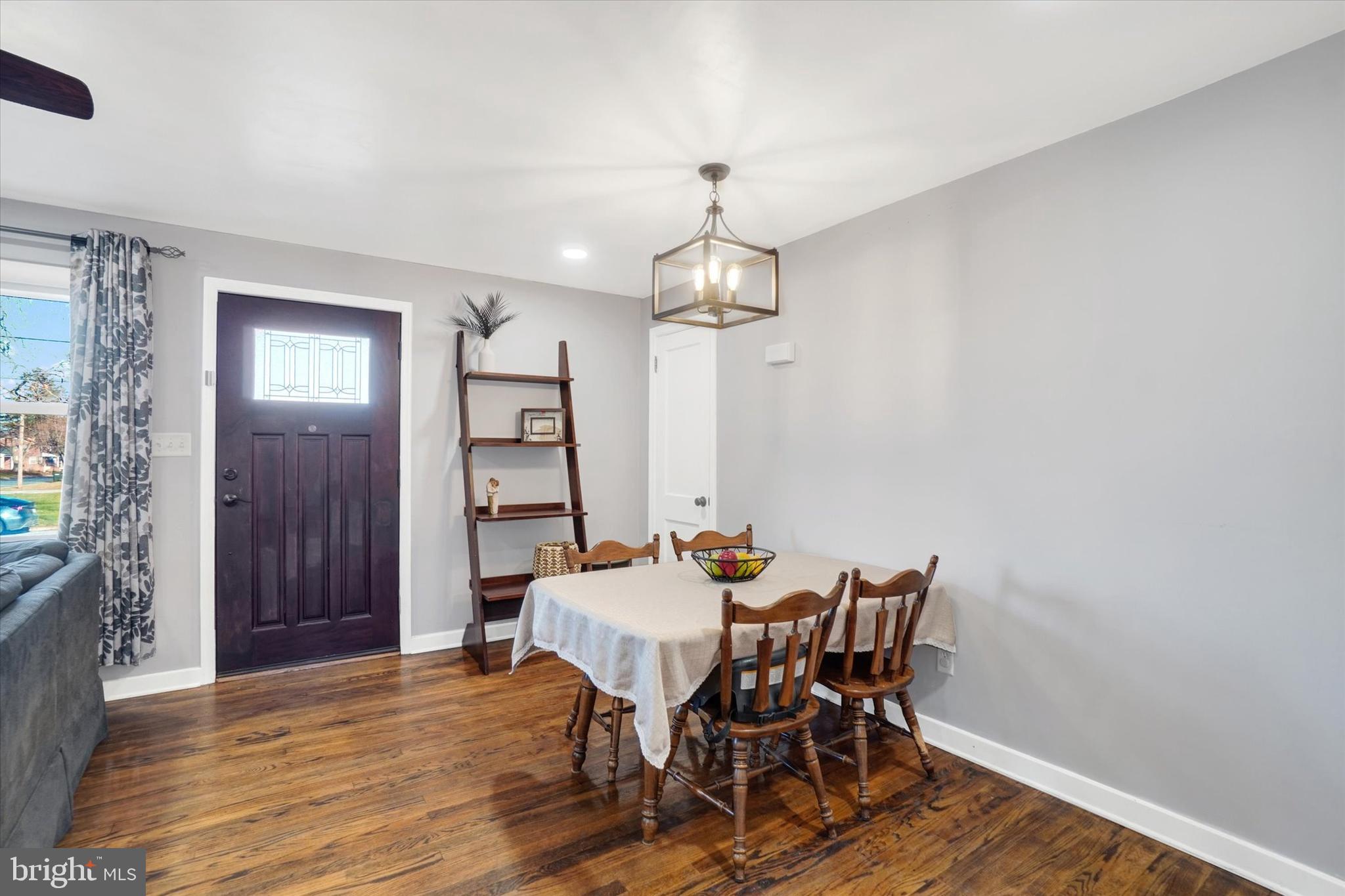 2090 Sycamore Road York, PA 17408 - Photo 4 of 27 a view of a dining room with furniture and wooden floor