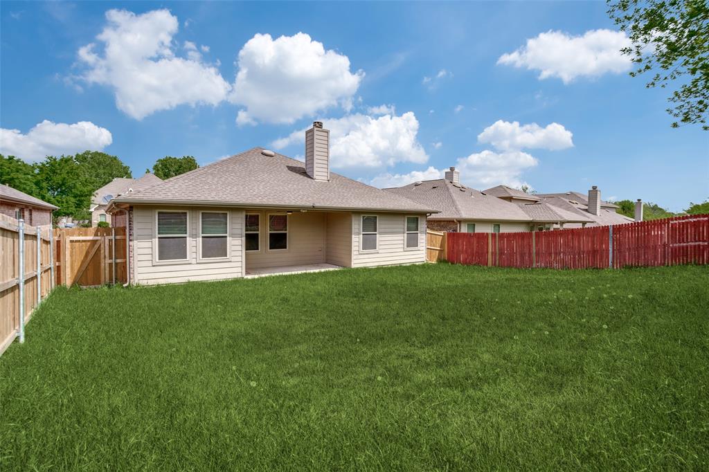 513 Wichita Trail McKinney, TX 75071 - Photo 12 of 12 a view of a house with a backyard