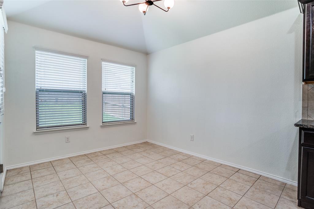 513 Wichita Trail McKinney, TX 75071 - Photo 10 of 12 a view of an empty room with a window