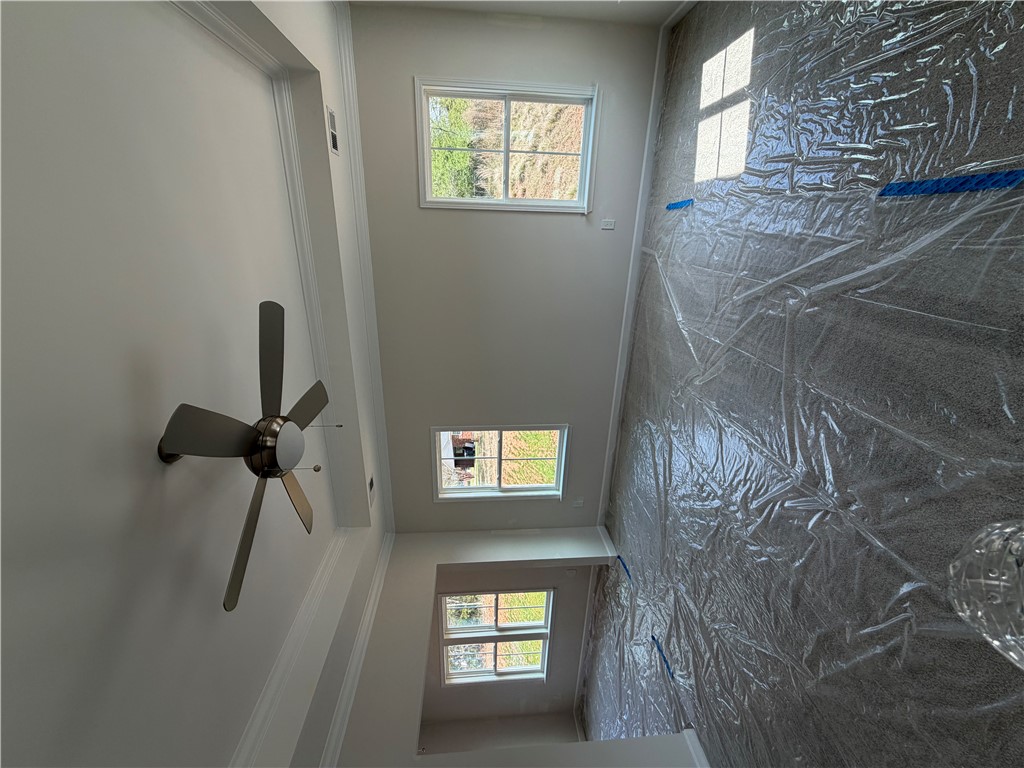 405 Botany Lane Anderson, SC 29621 - Photo 12 of 14 This newly constructed interior space features soaring ceilings and natural light.