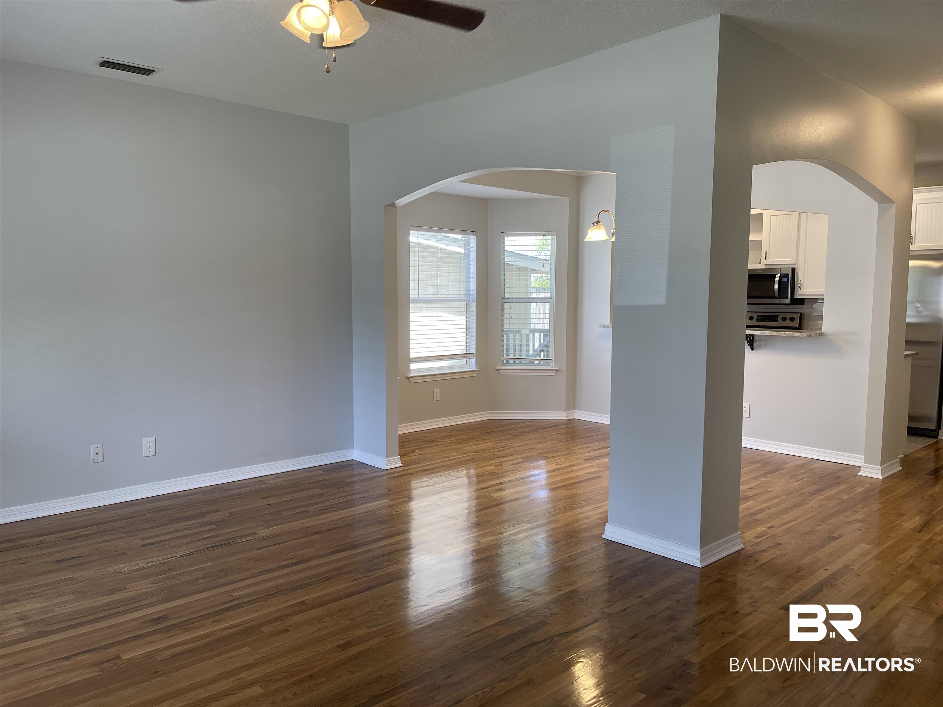 17472 Pandion Ridge, Unit 17472 Fairhope, AL 36532 - Photo 5 of 25 living/dining on main