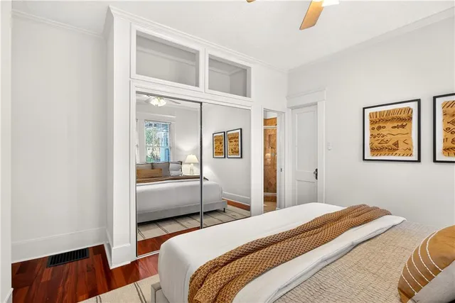 a bathroom with a shower a sink and a mirror