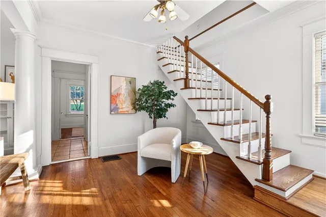 a view of an empty room with stairs