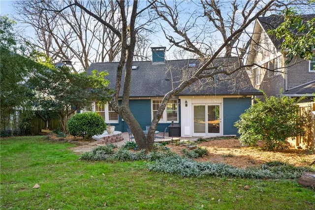 a view of a yard in front of a house