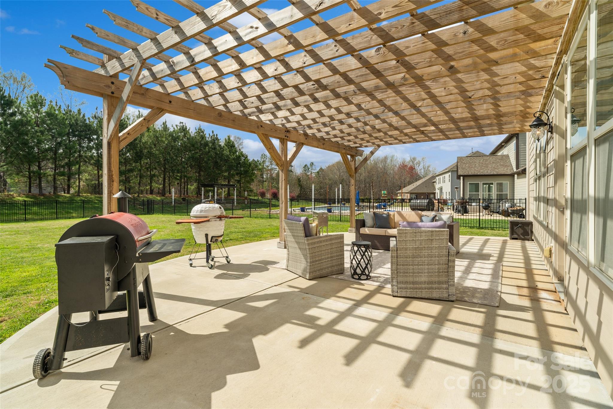 1022 Torrens Drive Monroe, NC 28110 - Photo 13 of 46 a view of a patio with a table and chairs