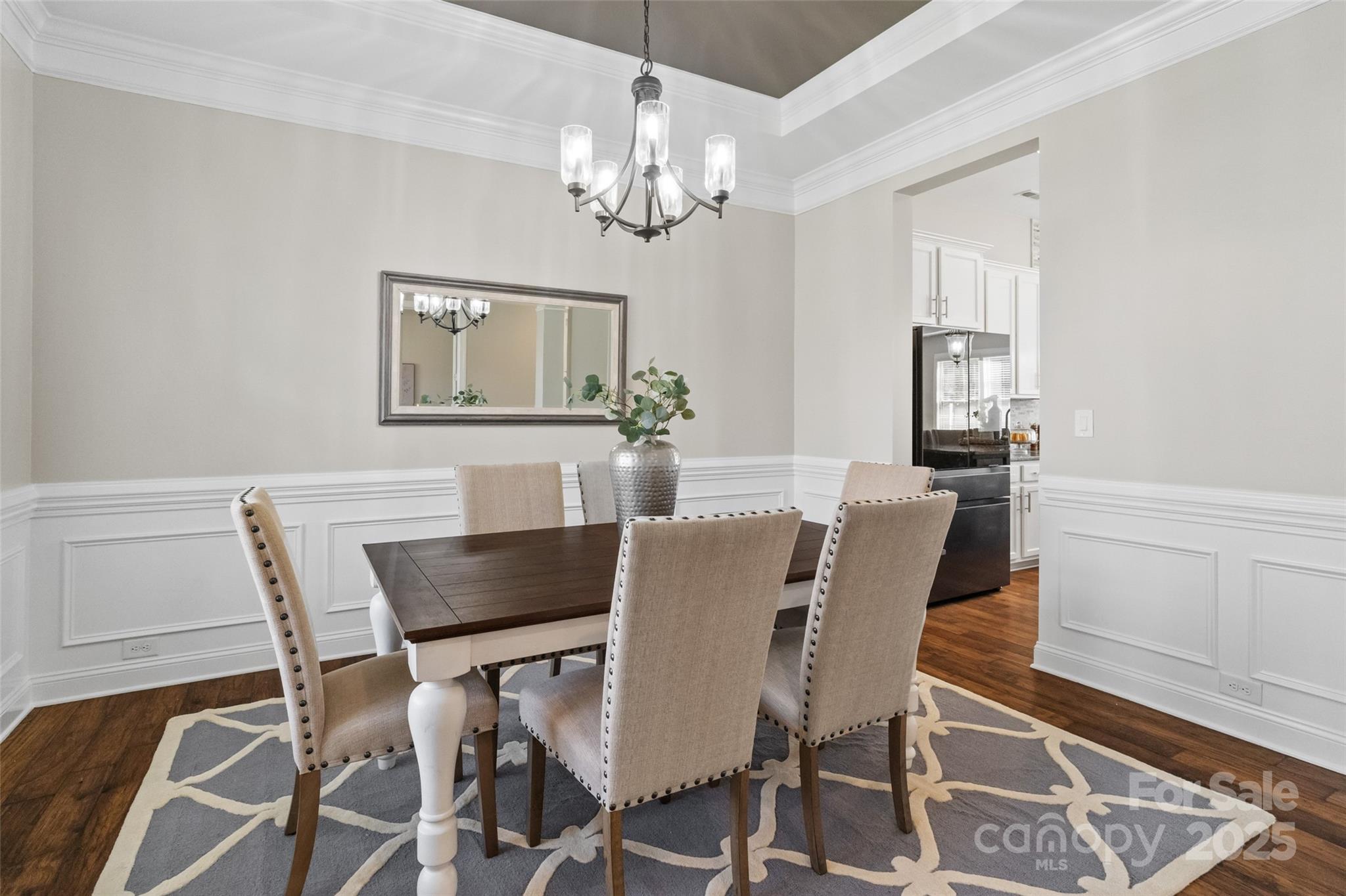 1022 Torrens Drive Monroe, NC 28110 - Photo 18 of 46 a view of a dining room with furniture and chandelier