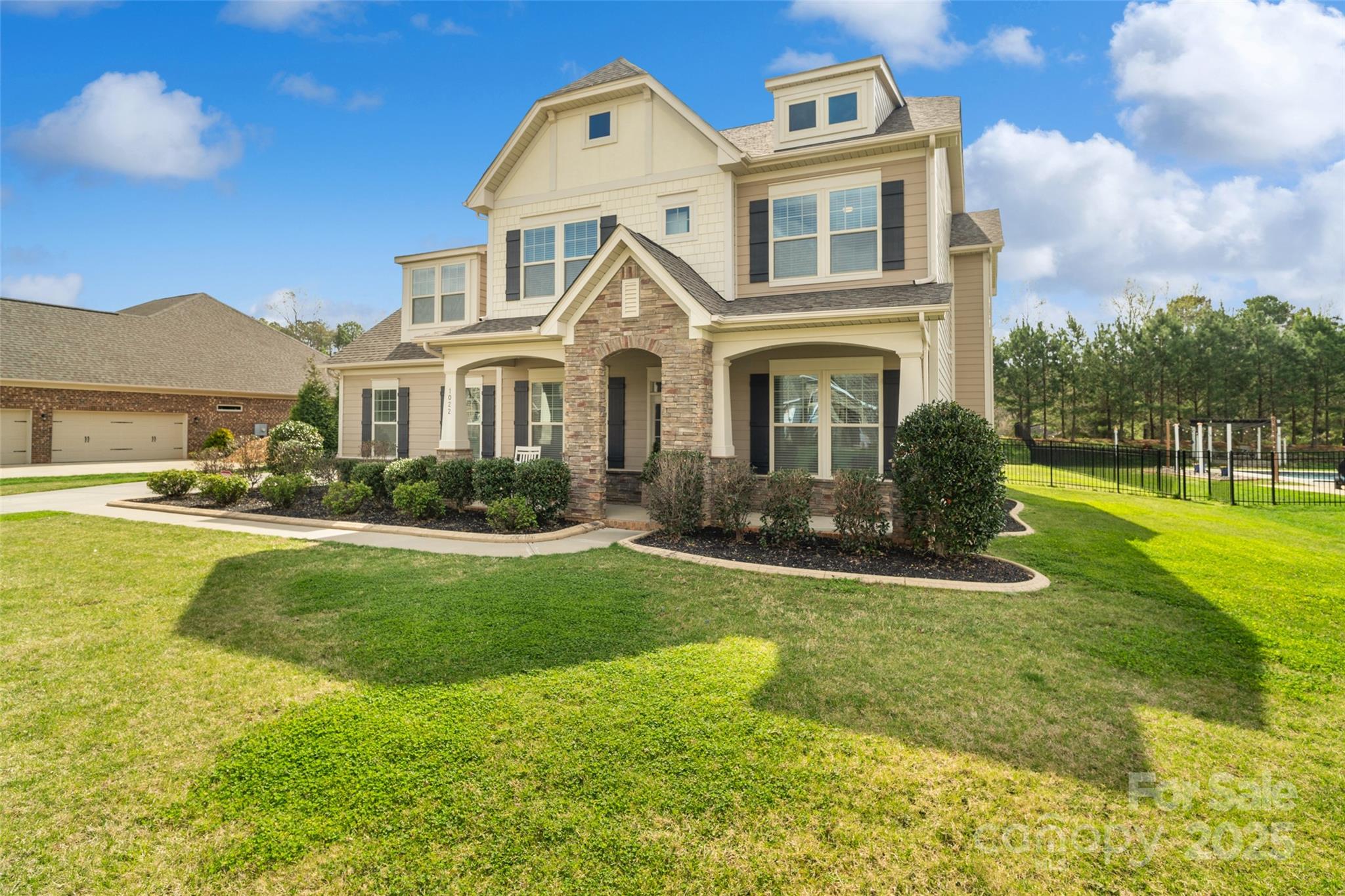 1022 Torrens Drive Monroe, NC 28110 - Photo 3 of 46 a front view of a house with a yard
