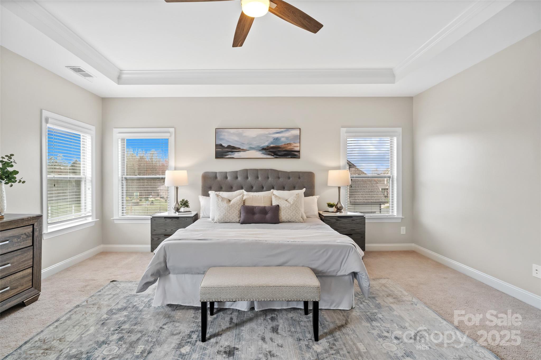 1022 Torrens Drive Monroe, NC 28110 - Photo 45 of 46 a bedroom with a bed and a dresser with rug