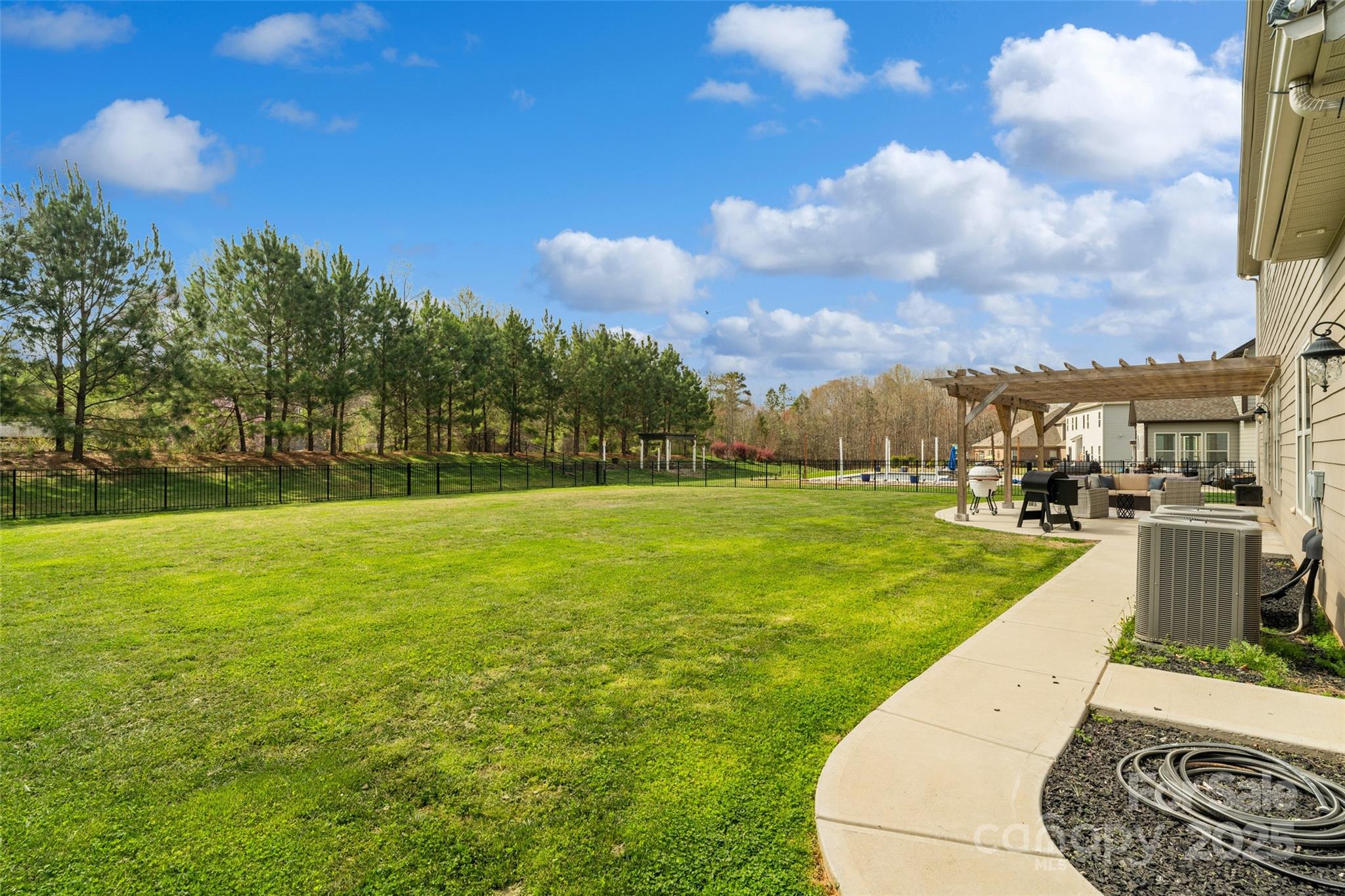 1022 Torrens Drive Monroe, NC 28110 - Photo 6 of 46 a view of a garden and basketball court
