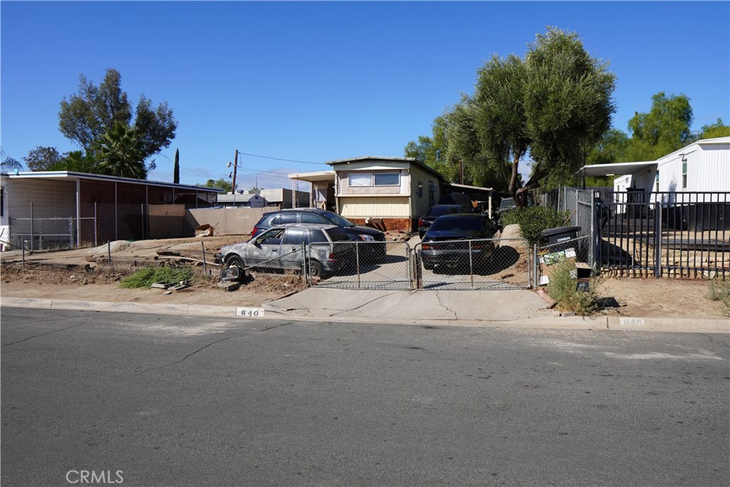 640 Apache Road Perris, CA 92570 - Photo 9 of 10 a view of a street with cars on road
