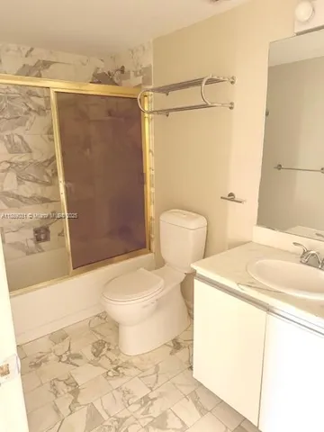 a bathroom with a sink and a shower