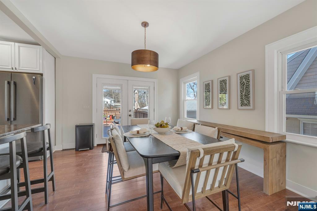 39 Vernon Terrace Bloomfield, NJ 07003 - Photo 12 of 39 a view of a dining room with furniture window and wooden floor