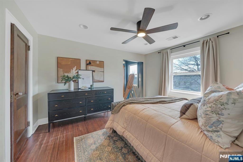 39 Vernon Terrace Bloomfield, NJ 07003 - Photo 19 of 39 a bedroom with a bed and a dresser