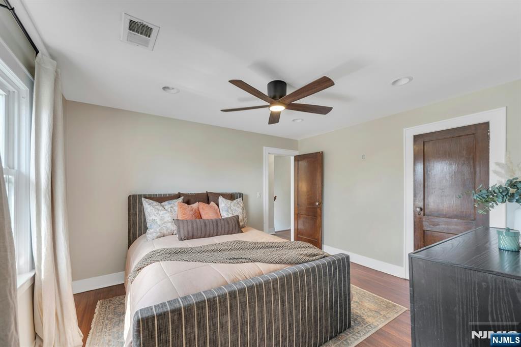 39 Vernon Terrace Bloomfield, NJ 07003 - Photo 20 of 39 a bedroom with a bed and a ceiling fan