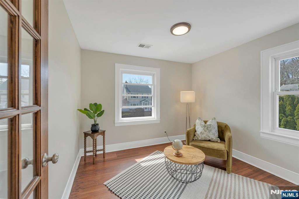 39 Vernon Terrace Bloomfield, NJ 07003 - Photo 24 of 39 a living room with furniture and a window