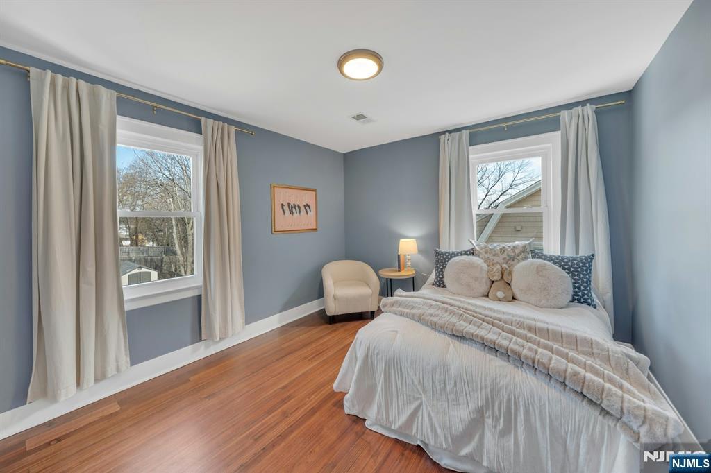 39 Vernon Terrace Bloomfield, NJ 07003 - Photo 25 of 39 a bedroom with double bed and a window