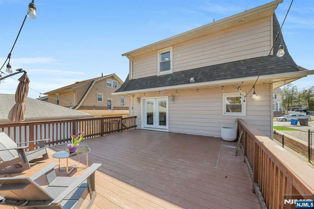 39 Vernon Terrace Bloomfield, NJ 07003 - Photo 32 of 39 a view of a deck with two chair and table