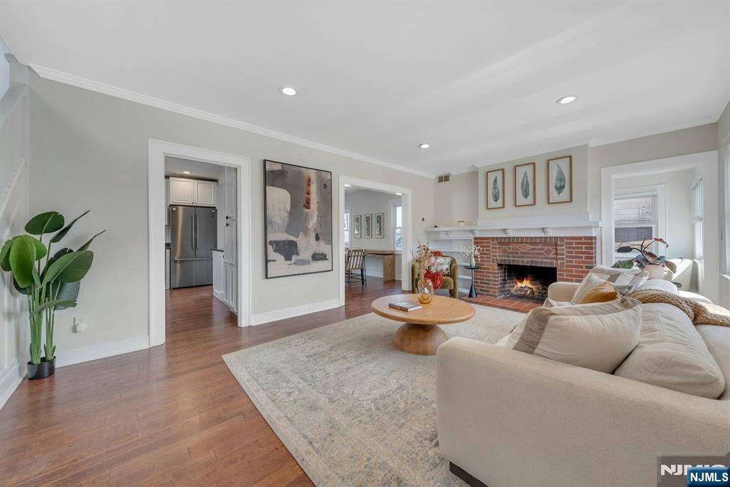 39 Vernon Terrace Bloomfield, NJ 07003 - Photo 8 of 39 a living room with furniture and a fireplace