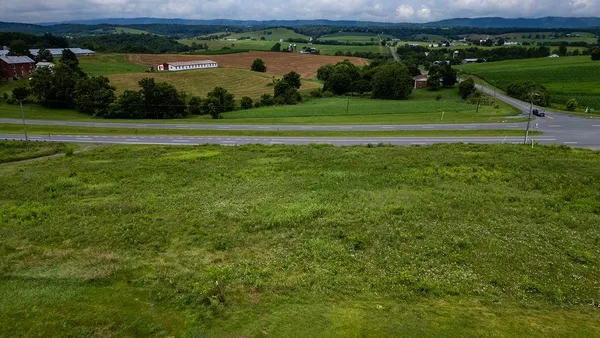 a view of a lake with a big yard