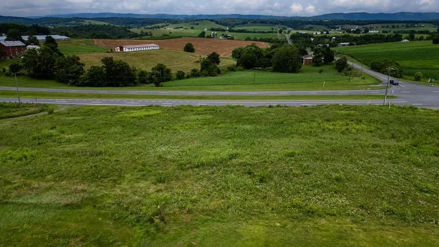 a view of a lake with a big yard
