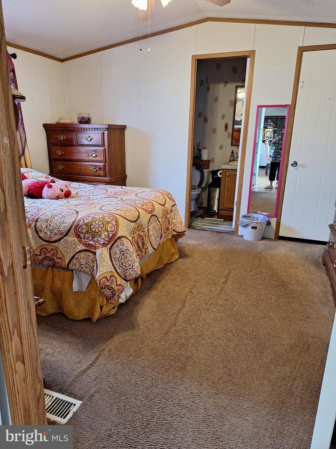 545 Imperial Way Falling Waters, WV 25419 - Photo 19 of 20 a bedroom with a bed and cabinets