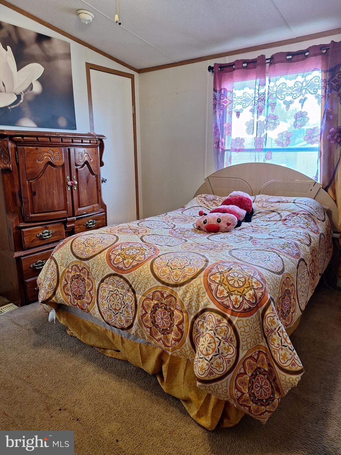 545 Imperial Way Falling Waters, WV 25419 - Photo 20 of 20 a bedroom with a bed and a window