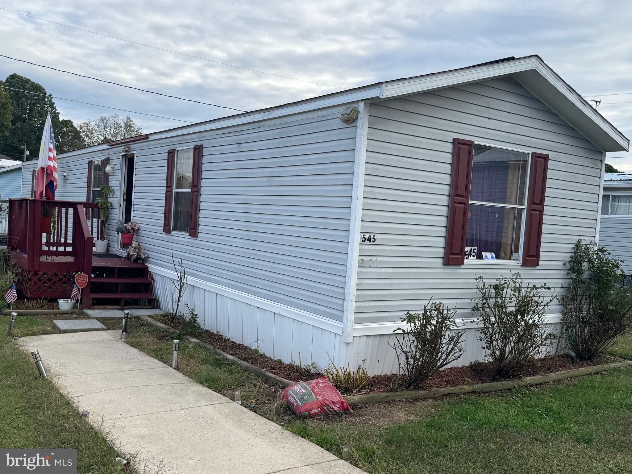 545 Imperial Way Falling Waters, WV 25419 - Photo 2 of 20 a front view of a house with garden