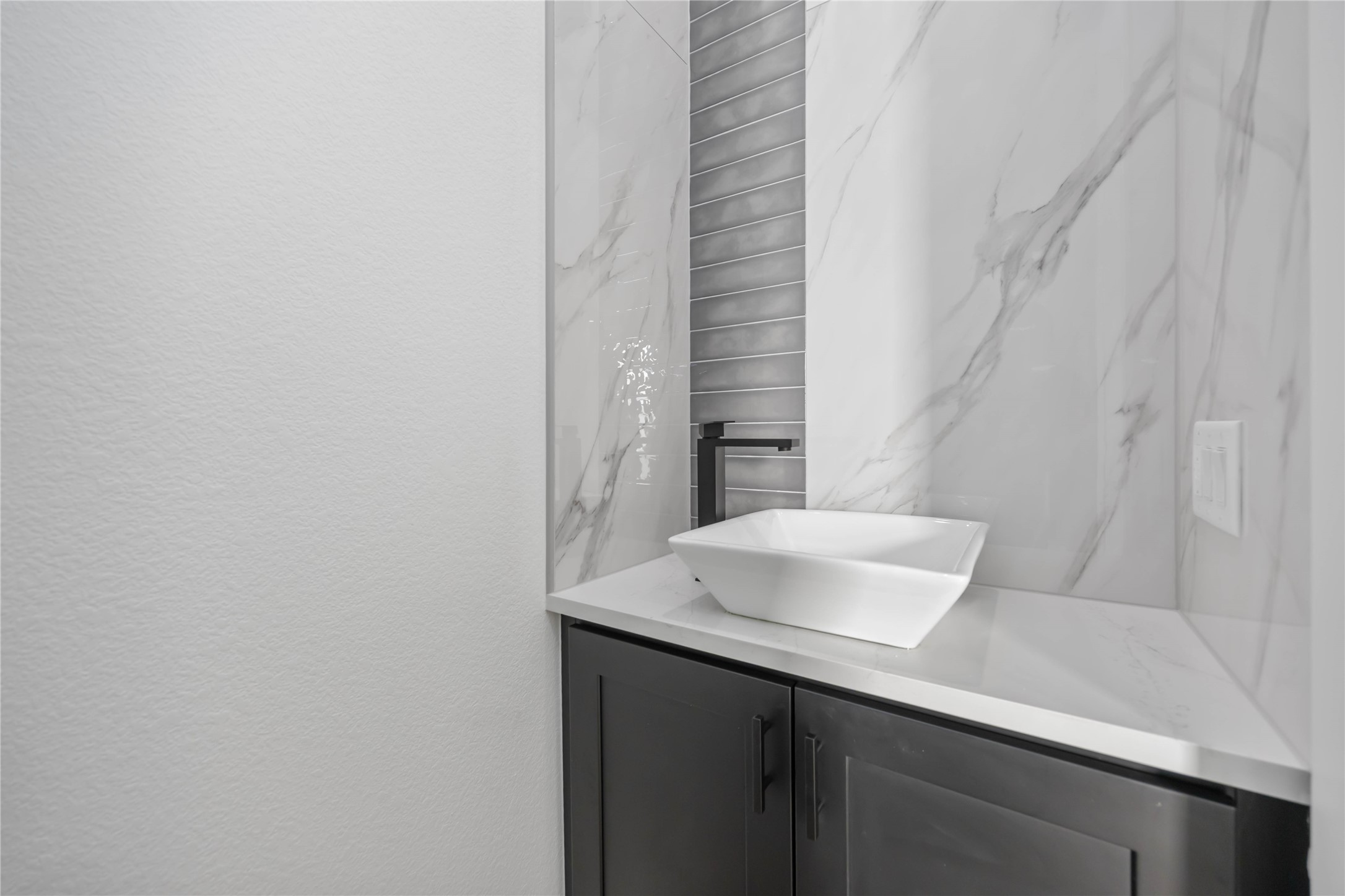 4533 Larkspur Street, Unit B Houston, TX 77051 - Photo 15 of 36 a bathroom with a sink and a mirror