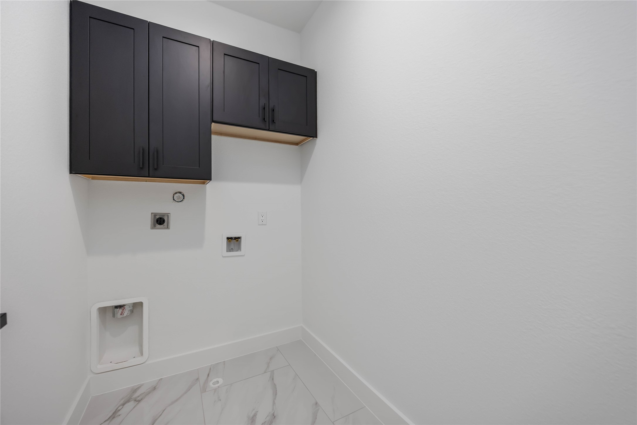 4533 Larkspur Street, Unit B Houston, TX 77051 - Photo 23 of 36 a view of kitchen with cabinets