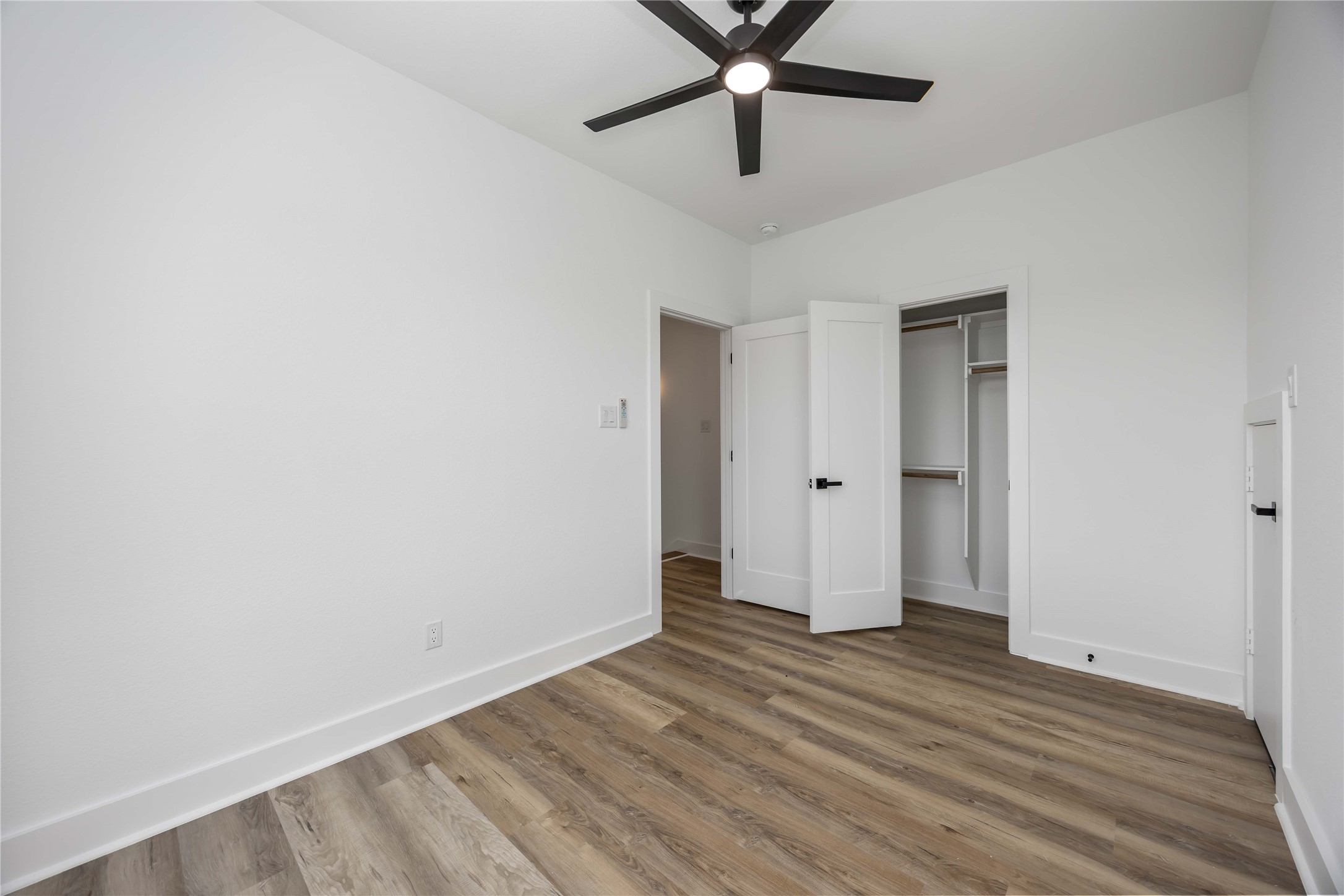 4533 Larkspur Street, Unit B Houston, TX 77051 - Photo 28 of 36 wooden floor in an empty room