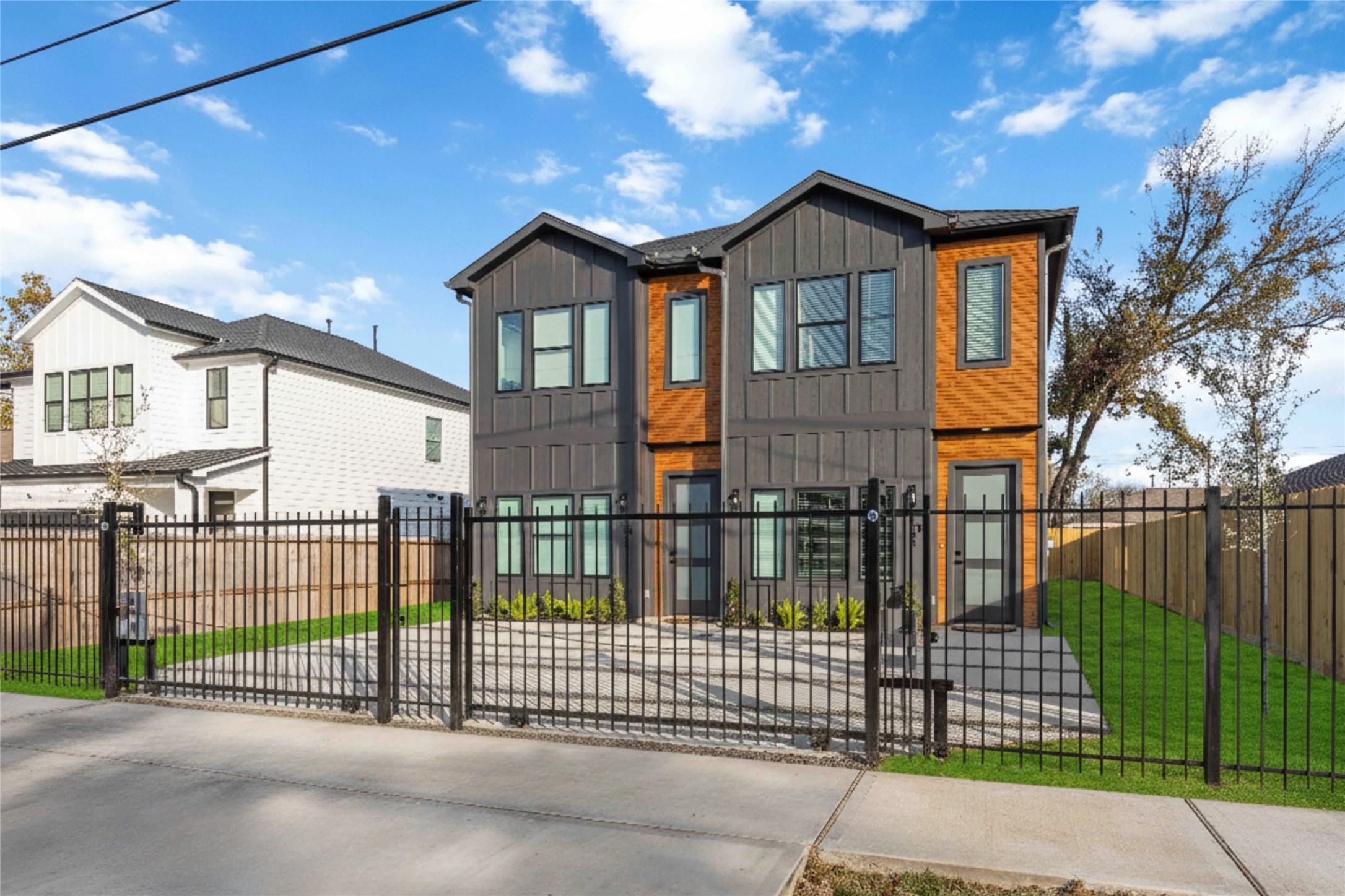 4533 Larkspur Street, Unit B Houston, TX 77051 - Photo 32 of 36 a view of a brick house and a iron gate