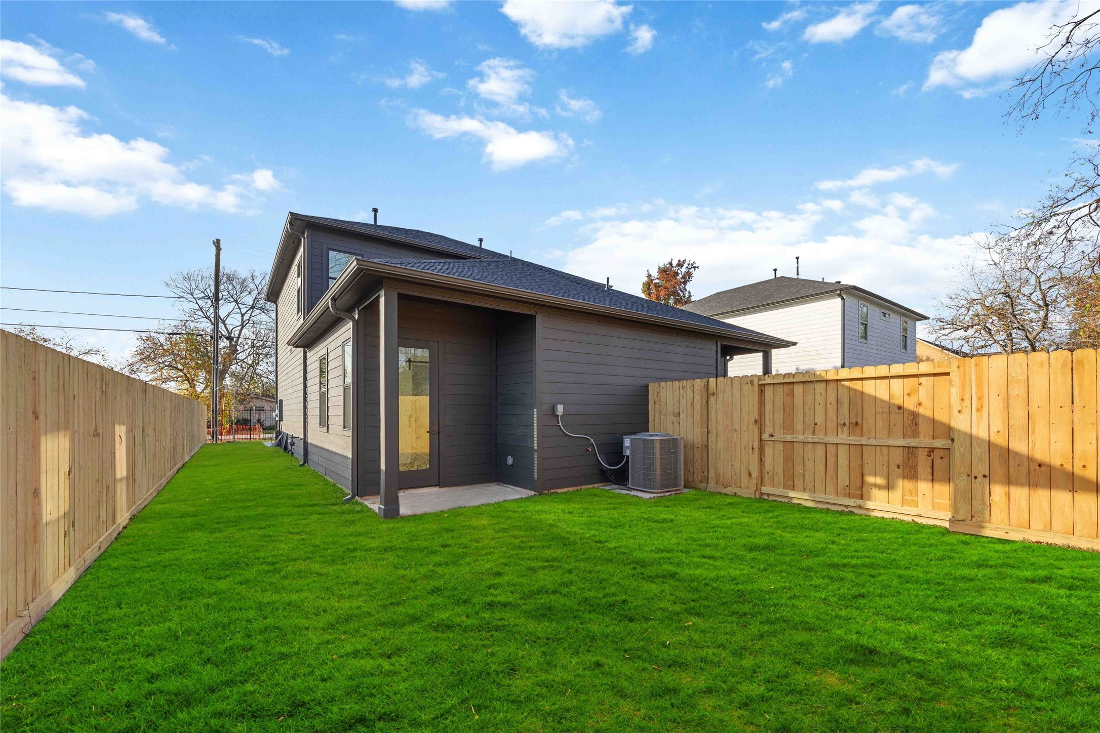 4533 Larkspur Street, Unit B Houston, TX 77051 - Photo 35 of 36 a view of a house with backyard and garden