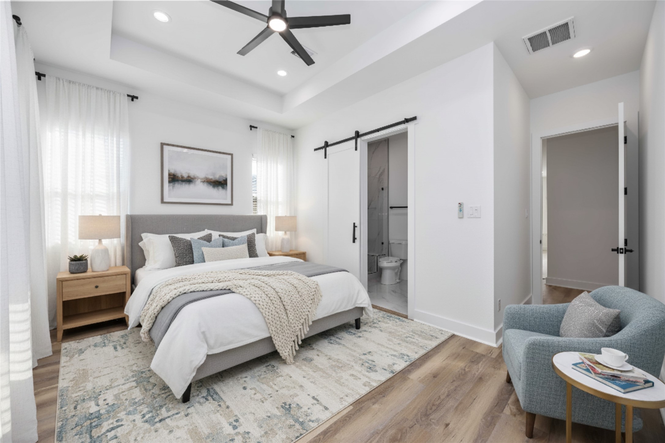 4533 Larkspur Street, Unit B Houston, TX 77051 - Photo 4 of 36 a spacious bedroom with a bed and a couch